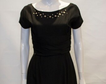 A Vintage 1950s Black Cocktail Dress