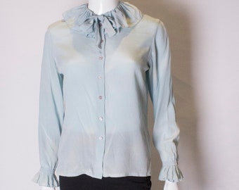 A Vintage 1970s Silk Blouse pale blue by Dana Cote d'Azur