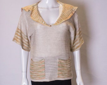 A Vintage 1970s Susan Small Jumper with Pockets