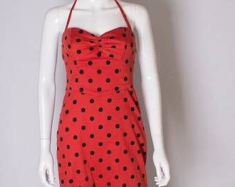 A Vintage 1950s style halter neck Polka Dot Dress by Betsey Johnson