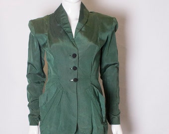 A Vintage bottle green 1940s Skirt Suit