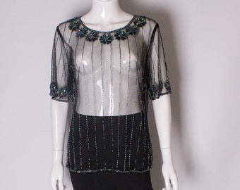 A Vintage 1980s Net T Shirt with Sequin and Bead Embellishment