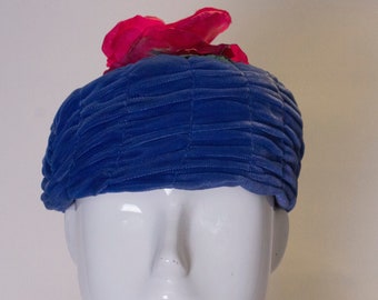 A Vintage 1960s Blue Velvet Hat with Pink Flowers