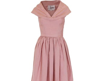 A vintage 1950s Dusty Pink Prom Style Vintage Dress