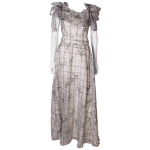 A Vintage 1970s grey printed silk evening gown by Gina Fratini image 1