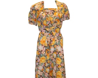 Een Vintage jaren 1940 bloemen bedrukte zomer jurk en Bolero
