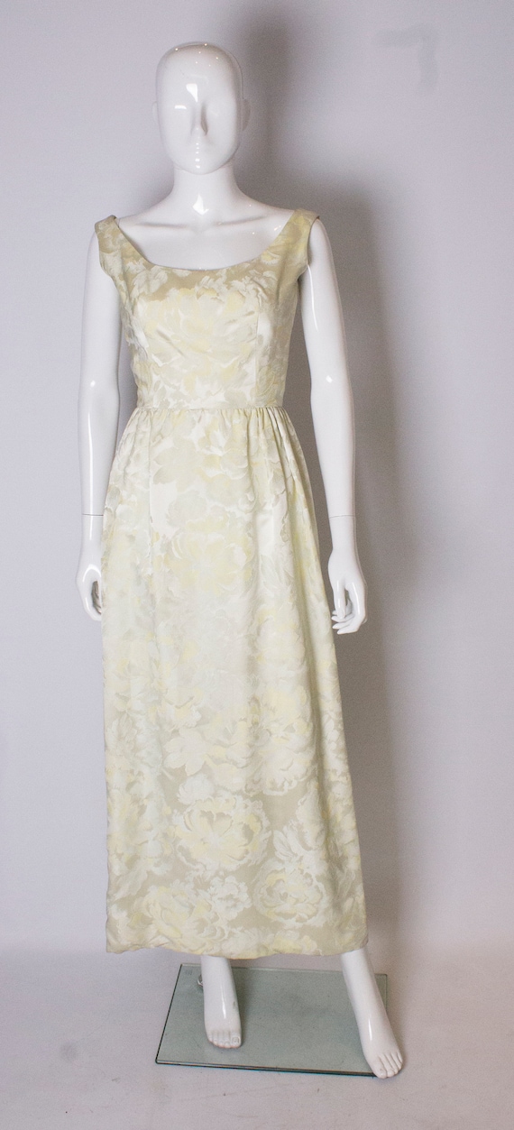 A vintage 1960s yellow floral brocade dress by Sar