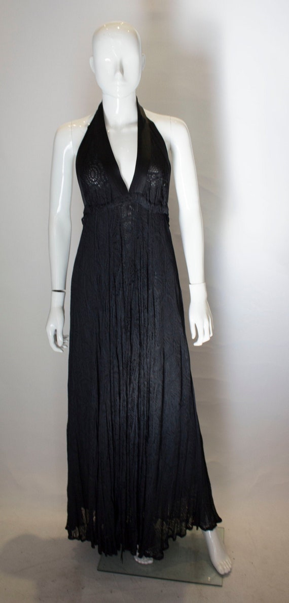 A Vintage 1970s Quorum Black Lace Halter Neck Dres