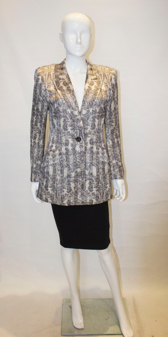 A Vintage 1980s Grey and White Escada Jacket