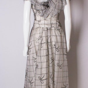 A Vintage 1970s grey printed silk evening gown by Gina Fratini image 7