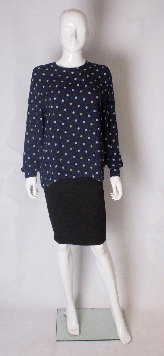 A Vintage 1990s navy polka dot silk blouse by Val… - image 1