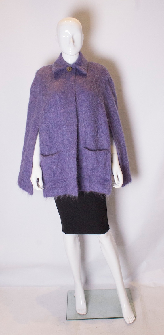 A Vintage 1970s Lavender Mohair Cape by Andrew Stu