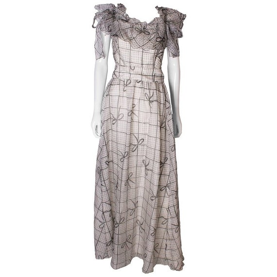 A Vintage 1970s grey printed silk evening gown by
