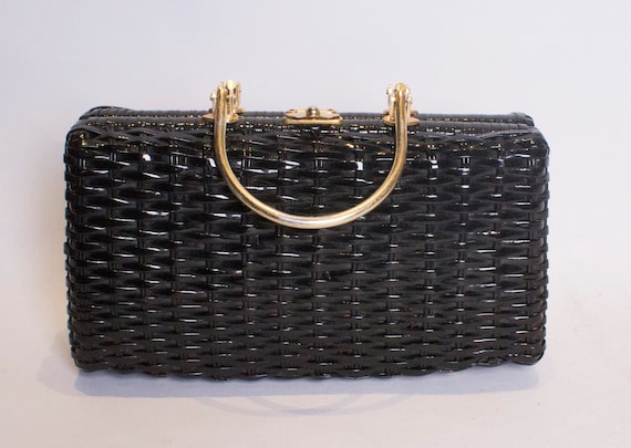 A vintage 1950s - 1960s balck wicker shiny box bag