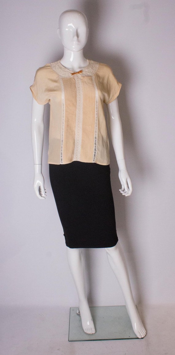 A 1950s Vintage Tea Stained Silk Top
