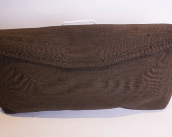 A vintage 1940s brown corde clutch bag