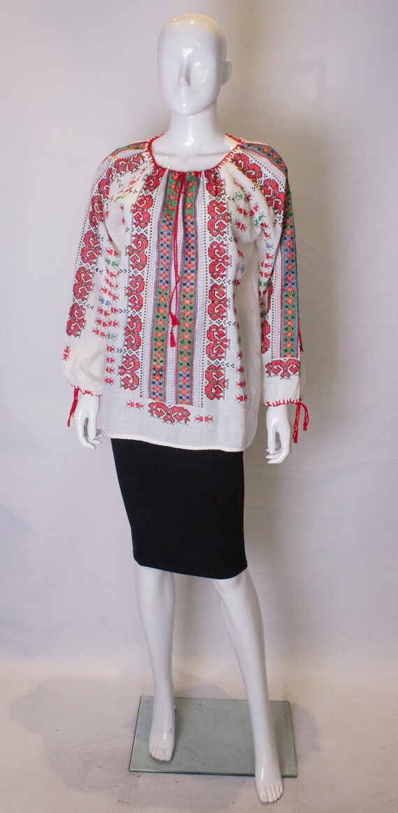 A Vintage 1970s embroidered peasant Boho Top