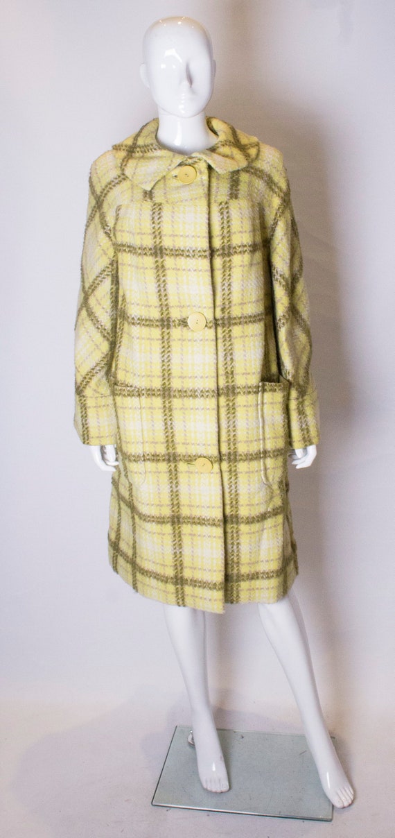 A Vintage 1950s yellow stripe Jacqmar Wool Coat