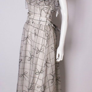 A Vintage 1970s grey printed silk evening gown by Gina Fratini image 3