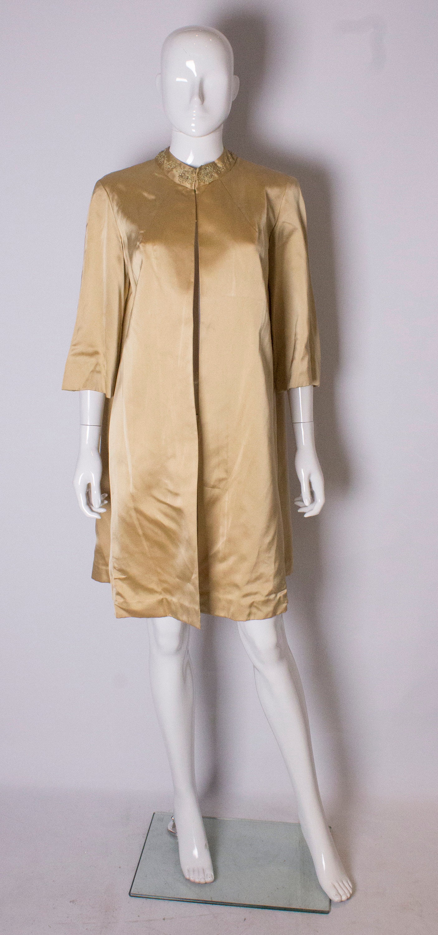 Image of A Vintage S Gold Saint Duster Coat By Carnegie
