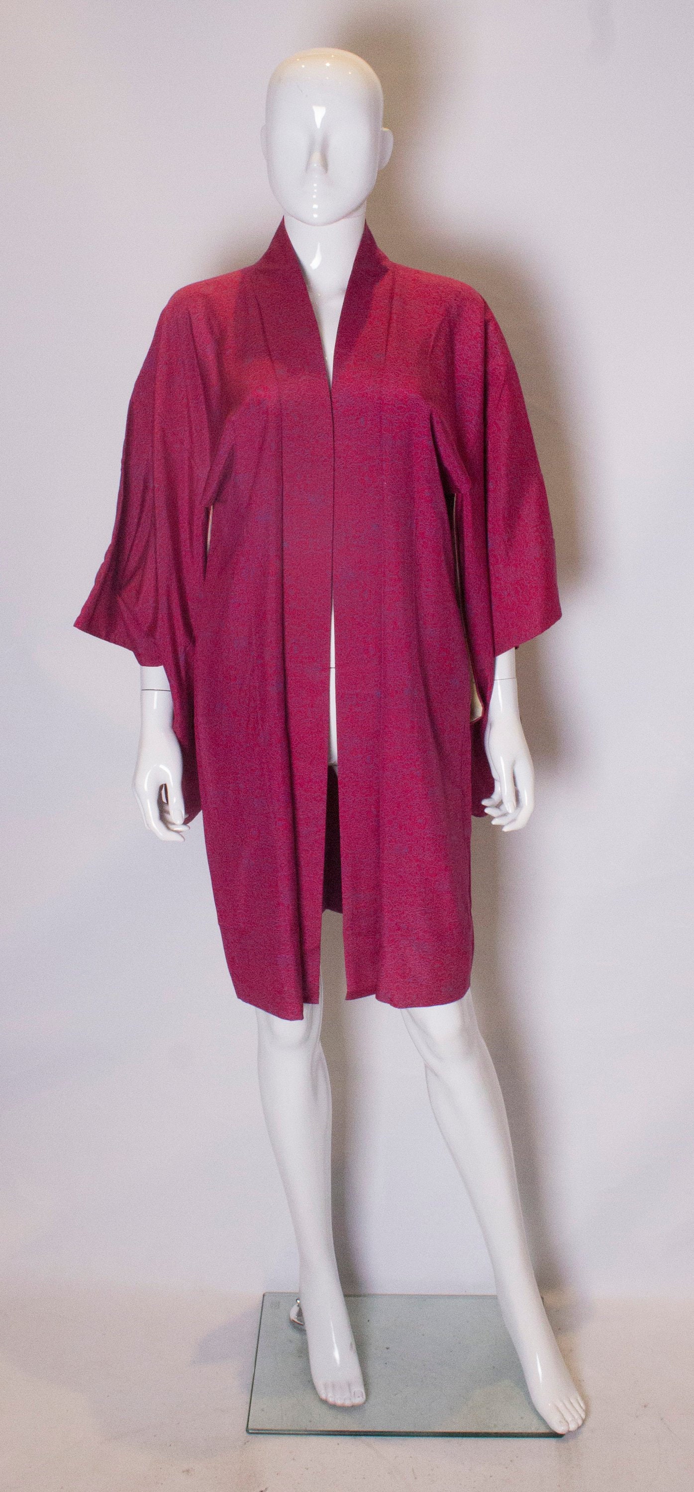 Image of A Vintage Silk Kimono Raspberry Pink Colour With A Blue Floral Design