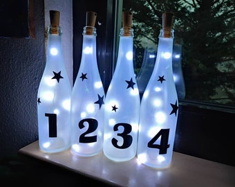 Upcycling: Adventskranz aus Sektflaschen, 2 versch.Designs