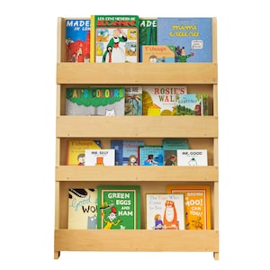 May include: A wooden bookshelf with four shelves, filled with colorful children's books. The books have titles like "Green Eggs and Ham", "Rosie's Walk", and "Mr. Silly".