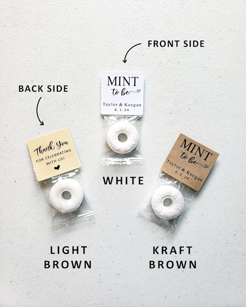 May include: Three favour boxes in white, light brown and kraft brown paper. Each box contains a white mint with a hole in the centre. The front of each box has a white label with the text "MINT to be" and the names "Taylor & Keegan" and the date "6.1.24". The back of the light brown box has a label with the text "Thank You for celebrating with us!"