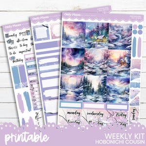 May include: Printable weekly planner stickers featuring a winter wonderland theme with watercolour illustrations of snowy landscapes, trees, and houses. The stickers include boxes for writing "Monday", "Tuesday", "Wednesday", "Thursday", "Friday", "Saturday", and "Sunday".
