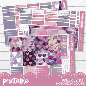 May include: Printable sticker kit designed for the Hobonichi Cousin planner. The kit features a purple and pink colour scheme with a heart pattern. The kit includes a variety of stickers, including boxes, banners, and hearts.