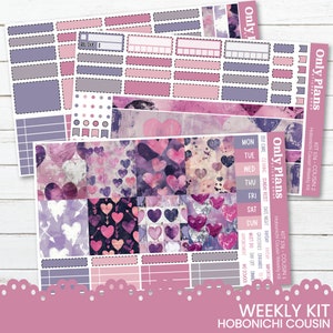 May include: A weekly planner sticker kit designed for the Hobonichi Cousin planner. The kit features a purple and pink colour scheme with a heart pattern. The stickers include boxes, banners, and a variety of other designs.