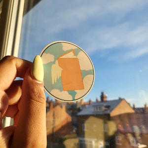 Flying Book Vinyl Sticker