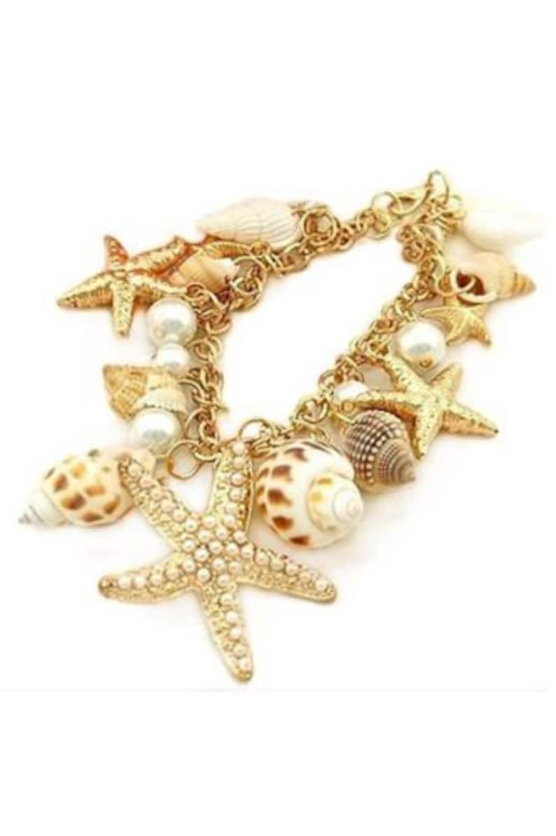 Armband Sommer Meer Muschel Seestern gold weiß Statement Urlaub Strand Charm Fuß Perlen Armkette Statement Kauri Bild 1