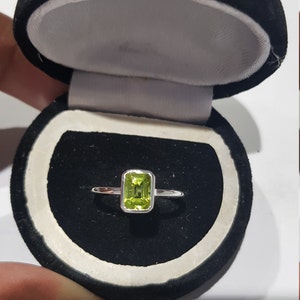 925 sterling silver rhodium plated natural emerald cut rectangular shaped peridot gemstone ring