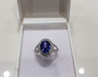 14k Weißgold Tansanit Ring mit Diamant Halo