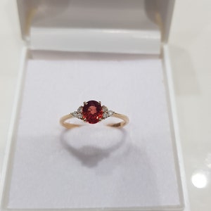 14k solid yellow gold natural AAA quality oval shaped orange sapphire precious gemstone and natural round brilliant cut  diamonds ring
