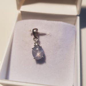 14k solid white gold natural AAA quality oval shaped star sapphire precious gemstone and natural round brilliant cut shaped diamonds pendant