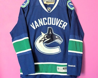 Camiseta de hockey Reebok vintage Y2K de los Vancouver Canucks, talla M/M, de la NHL.