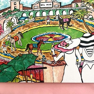 May include: An artistic painting of a horse race at Del Mar. The scene includes horses, jockeys, spectators, and green umbrellas. The painting features the text "DEL MAR" at the top.