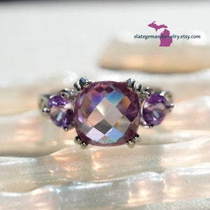 4 Carat Cushion Rose Cut Violet Pink Moissanite, with two lab-created alexandrites, in 925 Sterling Silver Accent Ring