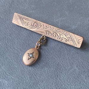 Antique Victorian engraved unique bar pin brooch with oval charm