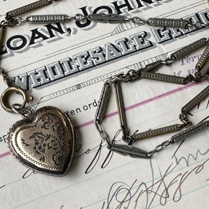 Vintage white gold filled heart locket and silver and gold tone watch chain lariat assemblage necklace