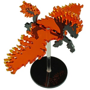 May include: A fiery orange and black acrylic sculpture of a horse with flames for a mane and tail. The sculpture is mounted on a black base with a clear acrylic rod.
