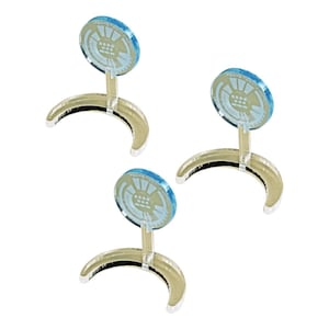 May include: Three clear acrylic stands with a crescent-shaped base and a circular top. Each top features a blue and white design with a white circle in the center.