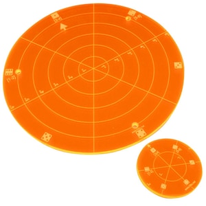 May include: Two orange circular acrylic templates with concentric circles and dice numbers printed on them. The larger template has a diameter of approximately 12 inches and the smaller template has a diameter of approximately 4 inches.