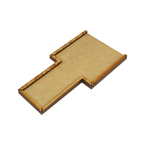 May include: A wooden T-shaped board with a brown surface and a light brown border. The board is designed for use in a tabletop game or miniature wargaming.
