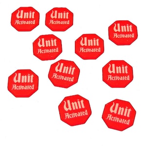 May include: Nine red octagonal tokens with white text that reads "Unit Activated".