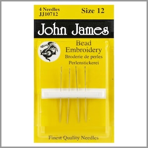 May include: A package of John James bead embroidery needles, size 12, with the text "4 Needles JJ10712". The needles are held in a white plastic holder, and the package is yellow with black and white text.