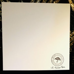 May include: A white card with a black and white stamp of an umbrella with the text "Dread Illustrations.com Limited Edition Print" and the text "LE Number Here" written below the stamp.