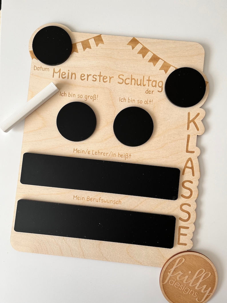 May include: Wooden sign with chalkboard inserts for a child's first day of school. The sign says "My First Day of School" and has spaces for the date, the child's age, the teacher's name, and a career aspiration. The sign is decorated with a festive banner and the word "CLASS" in large letters.